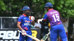 X/Cricket Nepal  : Dipendra Singh Airee (left) and Gulsan Jha at the crease during Nepal's ACC Premier Cup match against Saudi Arabia at Al Amerat, Oman on Wednesday (April 17, 2024).  