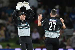 | Photo: Andrew Cornaga/Photosport via AP : NZ vs SL 2nd T20: New Zealand's Mitch Hay and Jacob Duffy celebrate the wicket of Sri Lanka's Kusal Perera