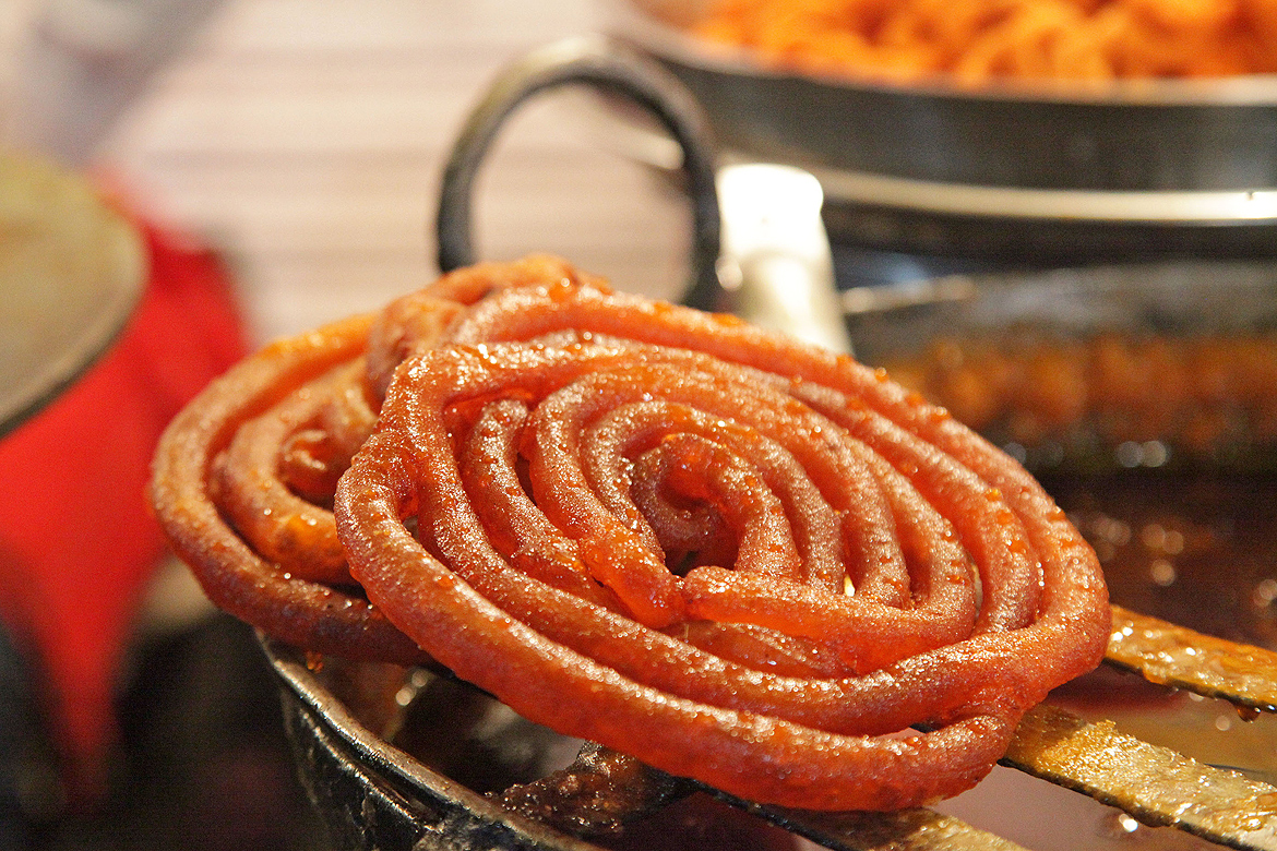 A jalebi ready to be devoured