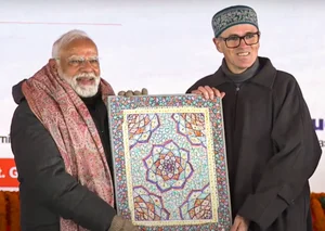 PTI : PM Modi and J&K CM Omar Abdullah 