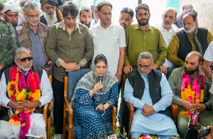 PTI Photo : Peoples Democratic Party (PDP) President Mehbooba Mufti welcomes Gujjar leader Qamar Ali, left, and his supporters from Rajouri