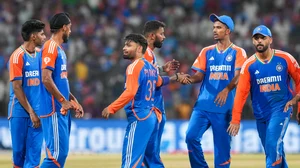 PTI Photo/Arun Sharma : India's Arshdeep Singh celebrates with teammates after taking the wicket of Bangladesh's Mustafizur Rahman during the first T20 International cricket match between India and Bangladesh.