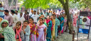 PTI : People wait to cast their votes for the Punjab gram panchayat elections, in Amritsar, Tuesday, Oct. 15, 2024. 