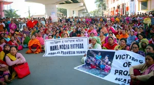 PTI : Members of Khwairamband Ima Keithel Joint Coordinating Committee for Peace (KIKJCCP) stage a protest over the alleged killing of three persons, in Imphal, Saturday, Nov. 16, 2024.