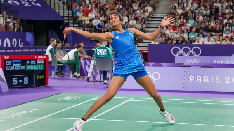 PV Sindhu returns to Estonias Kristin Kuuba. PTI Photo.jpg