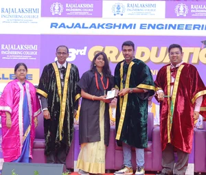 Cricketer Ravichandran Ashwin handing over a certificate and medal to a graduate at the 23rd Graduation Day at Rajalakshmi Engineering College