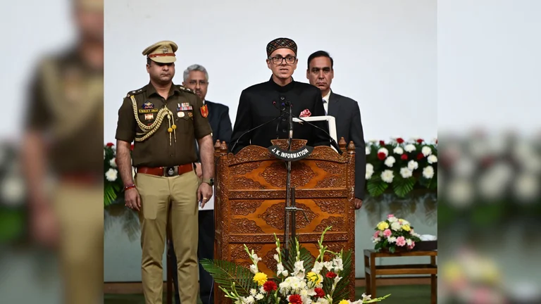 Jammu and Kashmir Chief Minister Omar Abdullah takes oath during his swearing-in ceremony, at Sher-i-Kashmir International Conference Centre (SKICC) on October 16, 2024 in Srinagar, India after the abrogation of Article 370 in 2019. - Waseem Andrabi/Hindustan Times via Getty Images