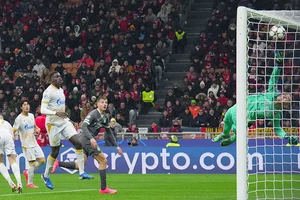 | Photo: Spada/LaPresse via AP : UEFA Champions League: AC Milan's Francesco Camarda, rear center, hits the crossbar 