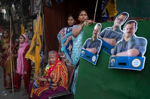 AP : Supporters of Aam Admi Party wait for the arrival of Sunita Kejriwal, wife of the jailed Party leader and Delhi Chief Minister Arvind Kejriwal, who conducted a roadshow ahead of the third round of polling in the six-week long national election in New Delhi, India.