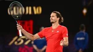 Alexander Zverev celebrates after sealing his win over Pouille