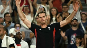 Andy Murray takes in the applause of the crowd after finishing his final match as a professional tennis player