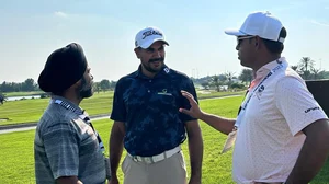 Photo: X / @anirbangolf : File Photo: Indian golfer Anirban Lahiri (Centre) in conversation with Gaganjeet Bhullar (R).