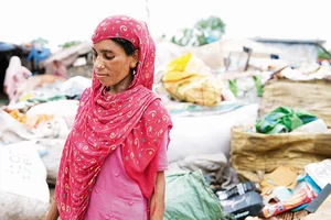 Photo: Divya Tiwari : Nowhere to Go: Shehnaz, who lives in a slum near Delhi’s Geeta Colony, says that while the heat was unbearable this year, it was worse during the heavy rains that followed—the roof of her hut is made of polythene sheets, which leaks from all directions