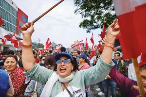 Photo: Getty Images : Staging a Protest: A cadre of Nepali Congress chant anti-government slogans