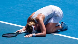 Paula Badosa collapsed to the court after her win over Coco Gauff.