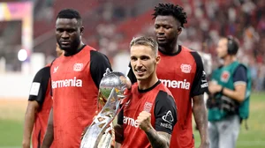 Bayer Leverkusen celebrate with the DFL-Supercup trophy