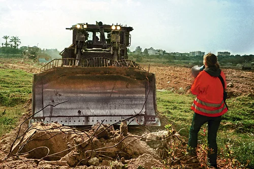 A Searing Memory American activist Rachel Corrie tries to stop an Israeli bulldozer from destroying Palestinian homes in the Gaza strip 