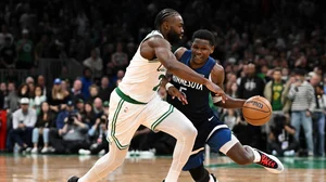 Jaylen Brown tussles with Anthony Edwards