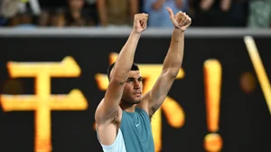 Carlos Alcaraz celebrates his win over Alexander Shevchenko