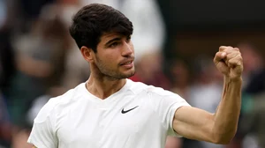 Carlos Alcaraz roars to the crowd after winning match point