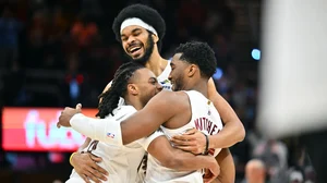 Darius Garland #10 Jarrett Allen #31 and Donovan Mitchell #45 of the Cleveland Cavaliers celebrate during the fourth quarter against the Oklahoma City Thunder.