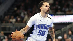 Cole Anthony #50 of the Orlando Magic handles the ball during a game against the Milwaukee Bucks in the NBA Emirates Cup Quarterfinal at Fiserv Forum on December 10, 2024 in Milwaukee, Wisconsin.