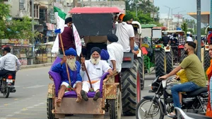 Photo: PTI : )FILE PHOTO)Farmers tractor march