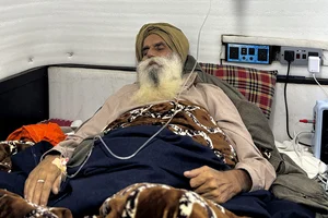 | Photo: PTI : Farmer leader Dallewal takes medical aid