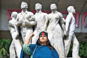 Photo: AP : People Power: Nourin Sultana Toma, a student at Dhaka University, at the university campus in Dhaka, Bangladesh