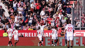 Sevilla celebrate Lukebakio's winner