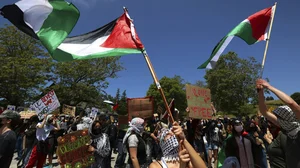 AP : University of California, Santa Cruz graduate students and other academic workers in the UAW 4811 union begin a strike and are joined by UCSC students for Justice in Palestine as they picket the main entrance to campus.