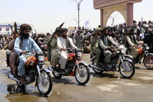 AP : FILE -Taliban fighters celebrate the third anniversary of the withdrawal of US-led troops from Afghanistan, in Lashkar Gah, Helmand province, southwestern Afghanistan, Aug. 14, 2024.