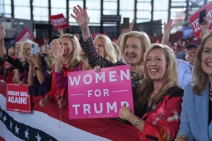 AP Photo/Evan Vucci : Women for Republican presidential nominee former President Donald Trump show their support as he arrives to speak during a campaign rally at J.S. Dorton Arena, Monday, Nov. 4, 2024, in Raleigh, N.C.