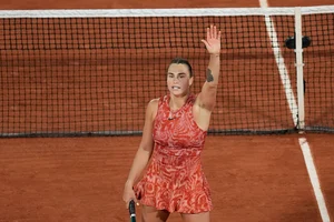 Photo: AP/Christophe Ena : French Open Tennis Championships