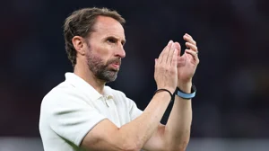 Jamie Carragher believes Gareth Southgate should remain in charge of England.