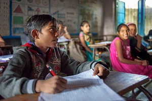 Children at the school in Raiyoli village in Balasinor Gujarat Rajasthan India. This is one of the excursion of the Luxury train Maharajas express.