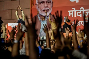 Getty Images : Narendra Modi speaks to the victorious party workers at the BJP party head quarters in New Delhi, India |