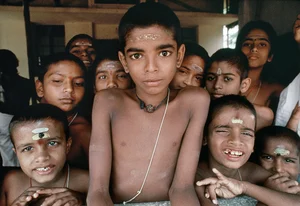 Getty Images : Boys from the Brahmin caste crowd around for a photo