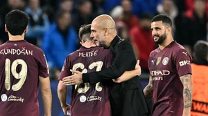 Pep Guardiola embraces James McAtee