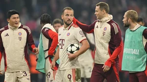 Harry Kane claims the match ball after Bayern Munich's dominant win