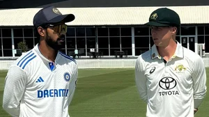 Photo: X | Cricket Australia : India A captain Ruturaj Gaikwad and Australia A skipper Nathan McSweeney during the toss for the 1st Unofficial Test match.