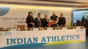 Photo: X | Athletics Federation of India : Adille Sumariwalla passing the baton to Bahadur Singh Sagoo as new AFI President.