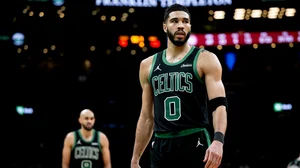 Tatum looks on during Boston's defeat to Atlanta.