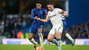 John McGinn in action against Chelsea