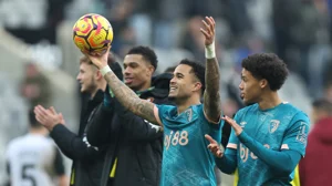 Justin Kluivert celebrates his hat-trick against Newcastle United