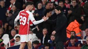 Kai Havertz pictured with Mikel Arteta.