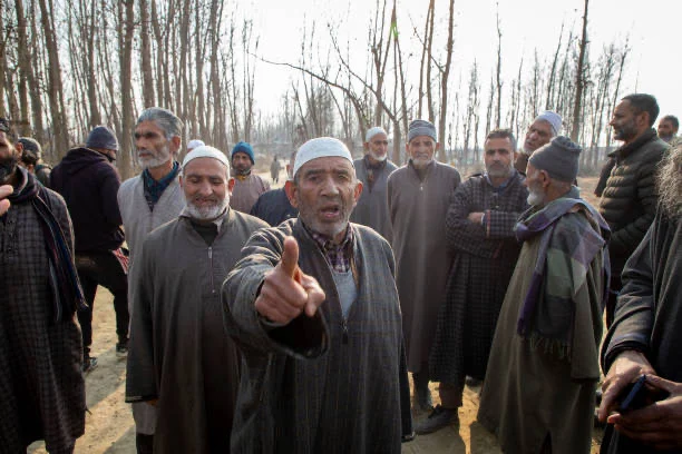 Kashmiri farmers gather at the under construction Srinagar to raise serious concern