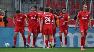 Holstein Kiel celebrate their equaliser against Bayer Leverkusen