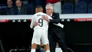 Kylian Mbappe and Carlo Ancelotti during Real Madrid's 4-2 win over Sevilla