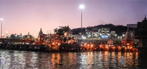 Shutterstock : Devotees line up on the banks of the Ganges during the Kumbh Mela